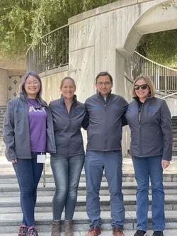 Group wearing new lab jackets