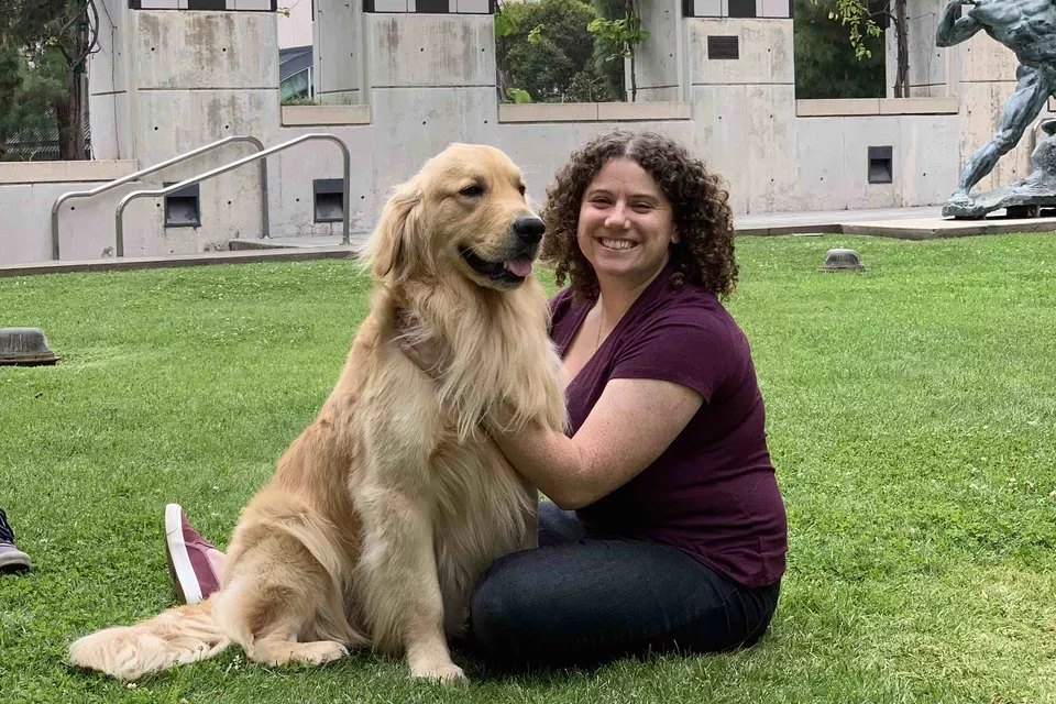 Woman with dog outside