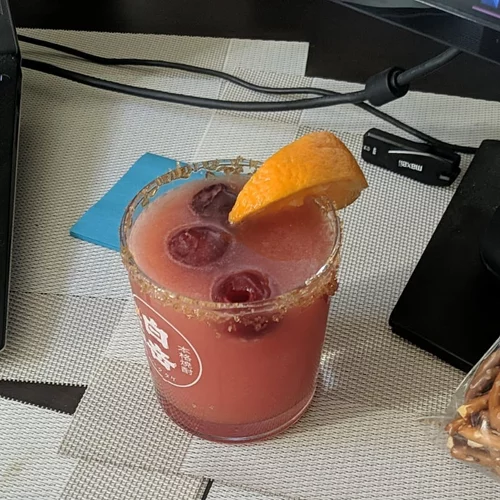 Pink mocktail with orange slice